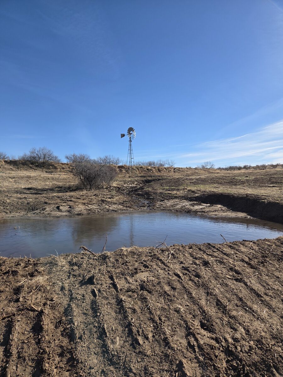 Windmill and solar well overflow capture